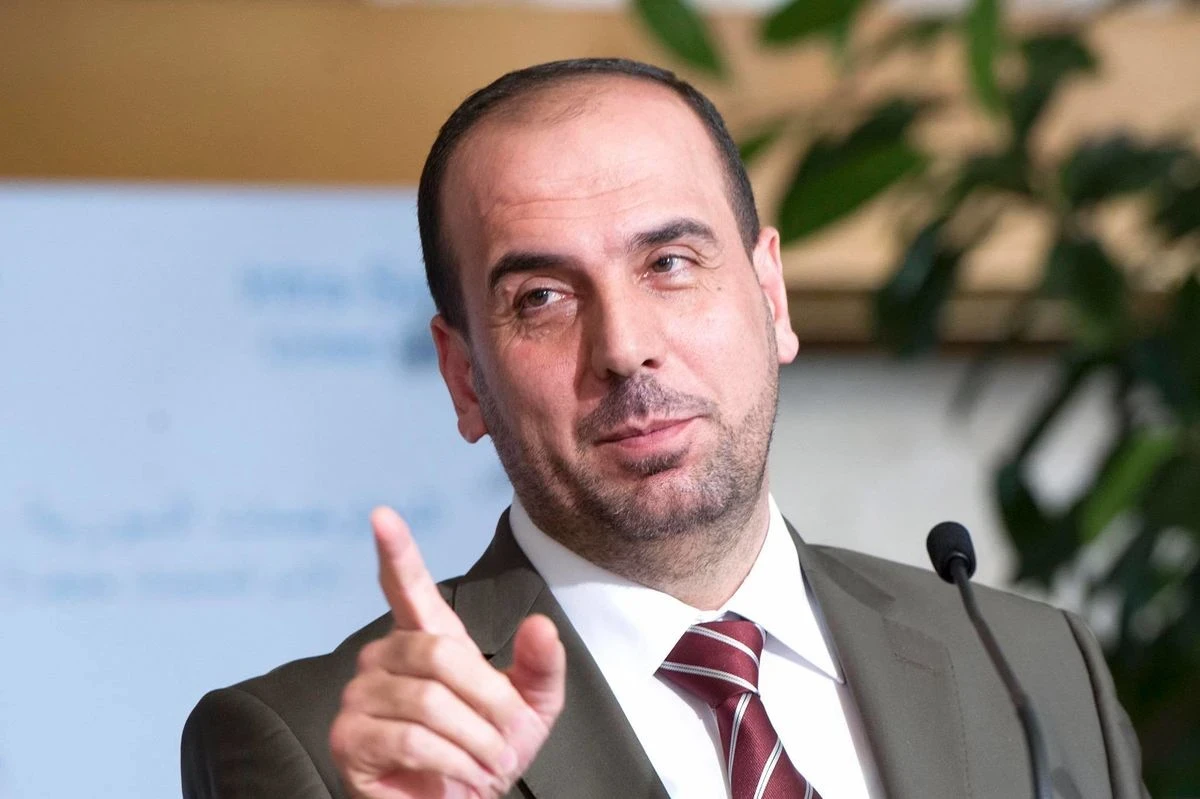 رئيس الائتلاف السوري المعارض يطالب تنظيماً مسلحاً بمغادرة سوريا.. ويركز في طلبه على أمرين